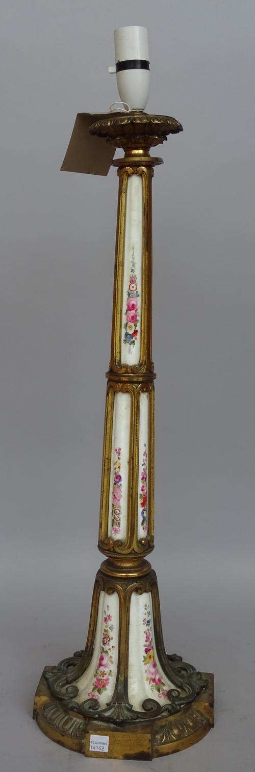 A French pottery and gilt metal mounted table lamp, late 19th century, (converted) on a circular base with foliate decoration to the pottery, 62cm hig