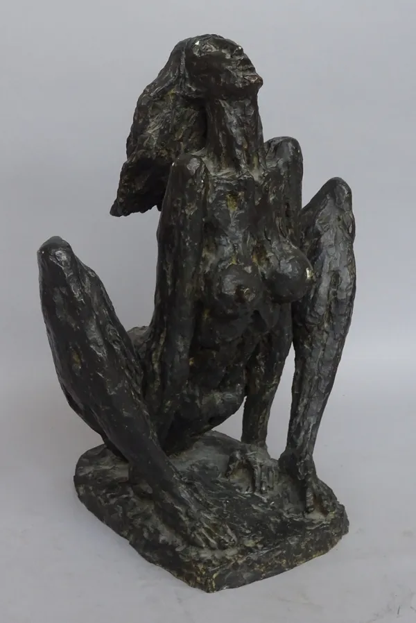 A modern composite bronze figure, modelled as a crouching female nude, signed 'PRYAS' to the cast. 43cm high.