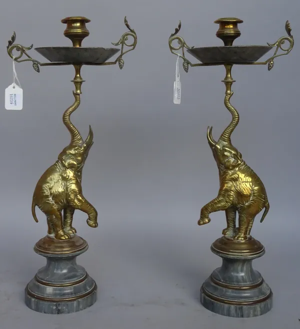 A pair of late 19th century French animalier candlesticks in the manner of Fantin-Latour, each with stem formed as elephant holding drip pan, pale blu