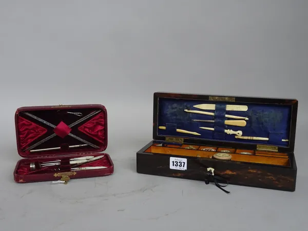 A Coromandel rectangular sewing box with hinged lid and fitted interior, 28cm wide and a mother-of-pearl dressing set in a velvet lined leather case,