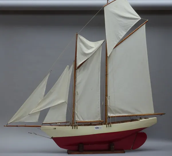 'Osprey', a schooner rigged yacht, built circa 1920, restored, 2010, on a wooden stand, 115cm high.