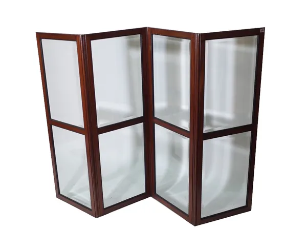 A late 19th century mahogany framed four division screen, with inset bevelled glass panels, 200cm wide x 137cm high. Provenance; property from the lat