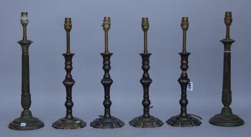 A set of four modern bronzed table lamps of 18th century design, 28.5cm high and one further pair of modern bronzed metal table lamps, (6).