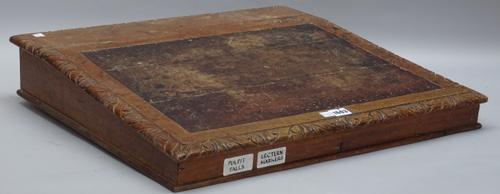 A Victorian carved oak table top writing slope with lift top superstructure, 61cm wide x 55cm deep.