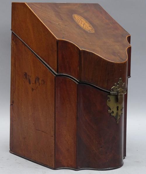 A George III inlaid mahogany slope top serpentine front knife box with later interior, 22cm wide x 35cm high.
