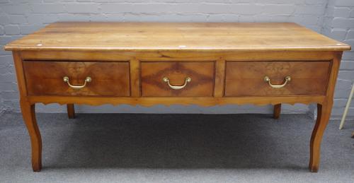 A 19th century French fruitwood dresser base, the shaped frieze with three frieze drawers on cabriole supports, 175cm wide x 78cm high.