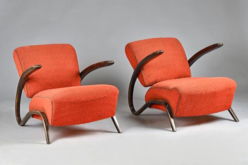 A pair of mid-20th century easy armchairs with ebonised beech bentwood frames and ball mounted waist, 60cm wide x 67cm high, (2).