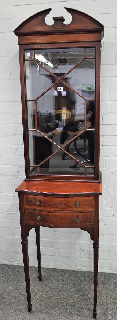 A late 19th century satin wood banded mahogany display cabinet on stand, the single astragal door over a bow two door base on tapering square supports