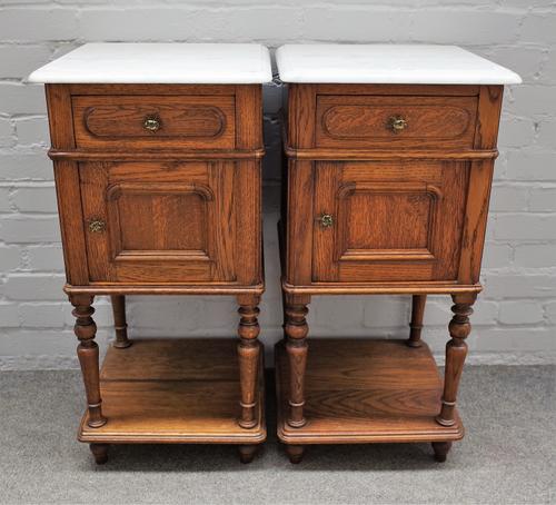 A pair of mid-19th century French marble top bedside tables, with single drawer over cupboard, 41cm wide x 83cm high, (2).