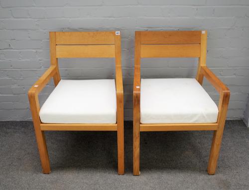 A pair of 20th century beech framed open armchairs, on block supports, 55cm wide x 82cm high, (2).