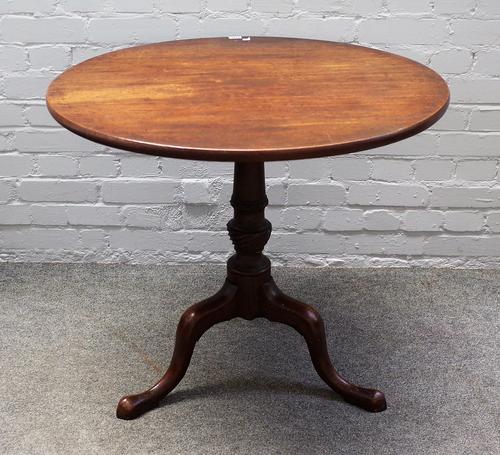 An 18th century mahogany circular tilt top table on tripod base, 79cm wide x 72cm high.