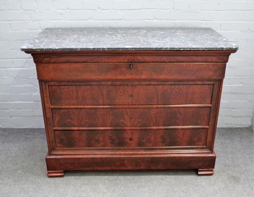 A 19th century French commode, the marble top over a mahogany base of five long drawers on bracket feet, 125cm wide x 95cm high.