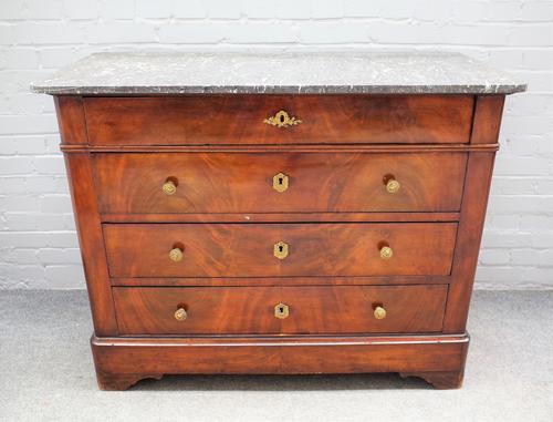A 19th century French commode, the marble top over a mahogany four drawer base, 121cm wide x 96cm high.