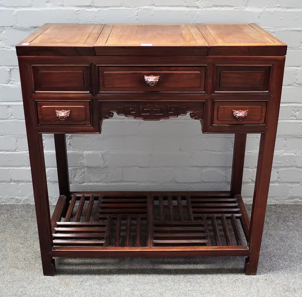 A 20th century Chinese hardwood dressing table with lift top mirror and side compartments over three drawer and cock pen undertier, 79cm wide x 85cm h