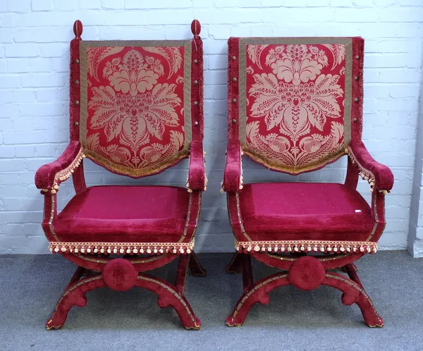 A pair of 19th century red velvet upholstered throne chairs of 16th century Italian style, 70cm wide x 122cm high, (2).