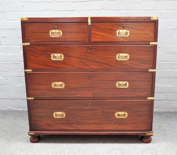 A campaign style brass mounted chest of two short and three long graduated drawers, 91cm wide x 92cm high.