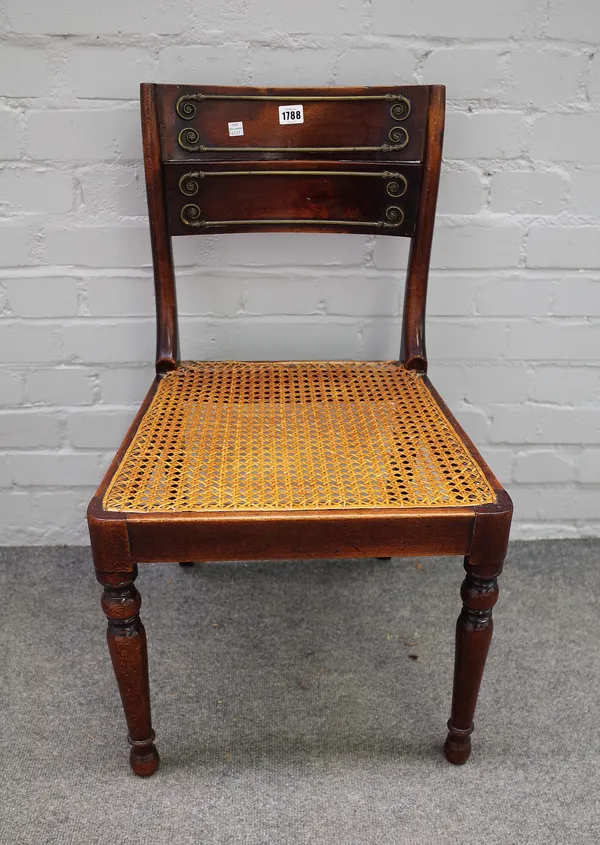 A Regency mahogany and beech side chair, with cane seat on turned supports, stamped GEE to underside, 45cm wide x 78cm high.Possibly John Gee, chair m