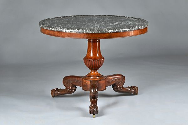 A 19th century French gueridon/centre table, circa 1830, the dished circular marble top on reeded baluster column and three lion's paw feet, 97cm diam