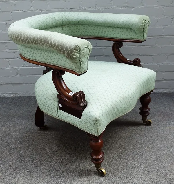 An early Victorian mahogany framed tub back armchair on turned supports, 75cm wide x 75cm high.