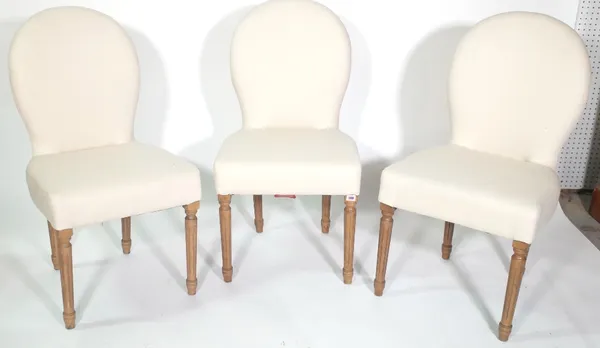 A set of three 20th century hardwood framed spoon back dining chairs on floral tapering supports. (3) Provenance; property from the late Sir David Tan