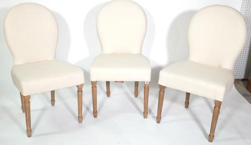 A set of three 20th century hardwood framed spoon back dining chairs on floral tapering supports. (3) Provenance; property from the late Sir David Tan