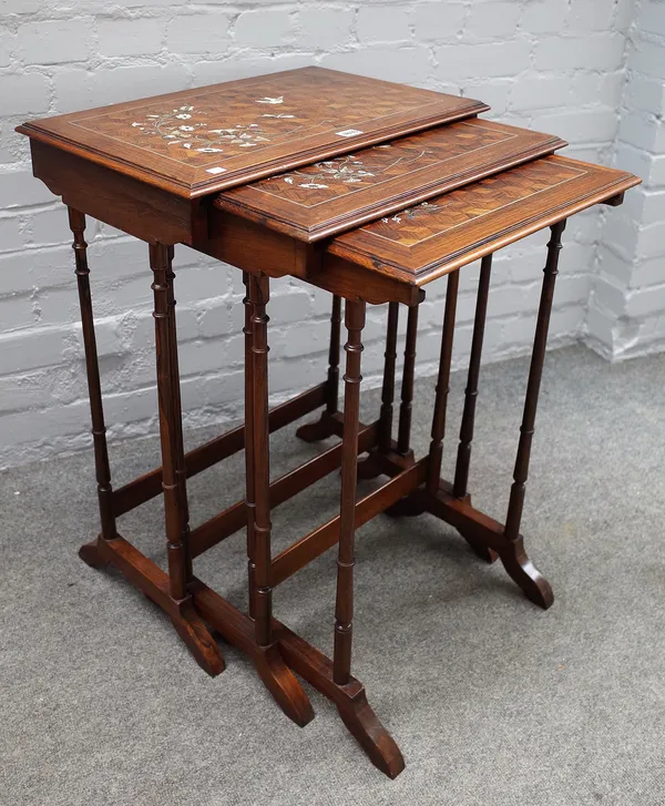 Maurice Wimphen & Fils Paris; a nest of three late 19th century Chinese mother-of-pearl inlaid cube parquetry inlaid occasional tables on turned suppo