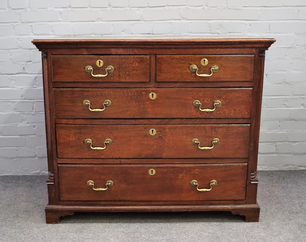 A mid-18th century oak chest of two short and three long drawers flanked by rounded corners, 109cm wide x 91cm high.