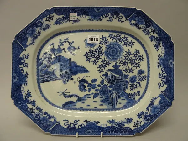 A Chinese export blue and white octagonal dish, Qianlong, painted with a quail and a grasshopper on a riverbank, a fenced garden on the other side, 40