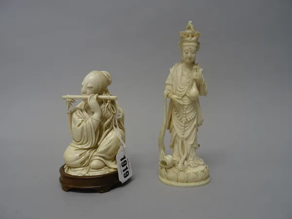 A Japanese ivory okimono of a musician, Meiji/ Taisho period, carved as a seated young woman playing the flute, 11.5cm. high, wood stand; and an ivory