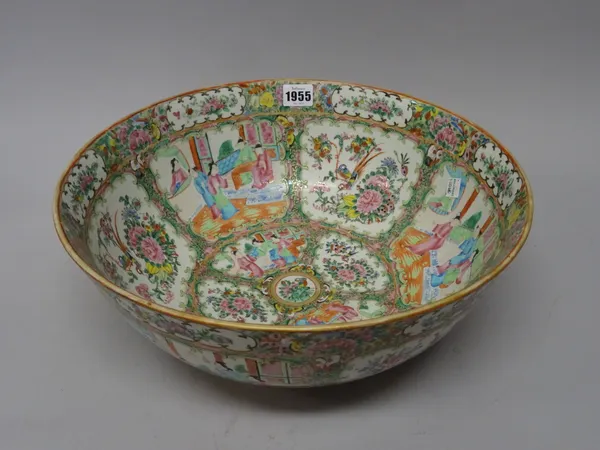 A Canton famille-rose punchbowl, 19th century, painted with panels of flowers alternating with panels of birds amongst flowers, 36.5cm. diameter.