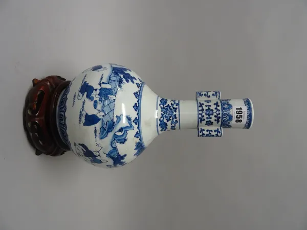 A Chinese blue and white `boys' vase, modern, of bottle form with two lug handles, decorated with boys at play in a landscape, apochryphal Qianlong ma