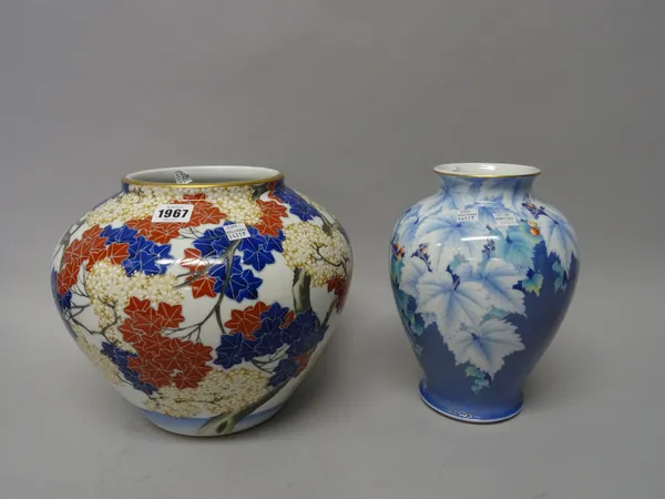 A Japanese Koransha vase, 20th century,  painted with maple and cherry blossom, blue orchid mark, 25cm. high; and a Koransha baluster vase painted wit