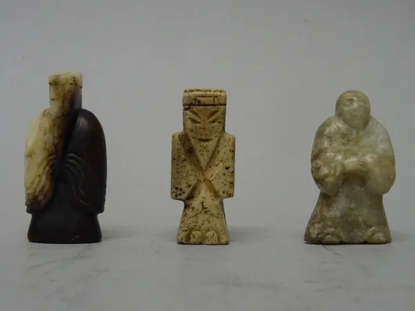 Three small Chinese jade figural carvings, probably Han dynasty, of various tones, two as beads, tallest 5.5cm. high, (3).