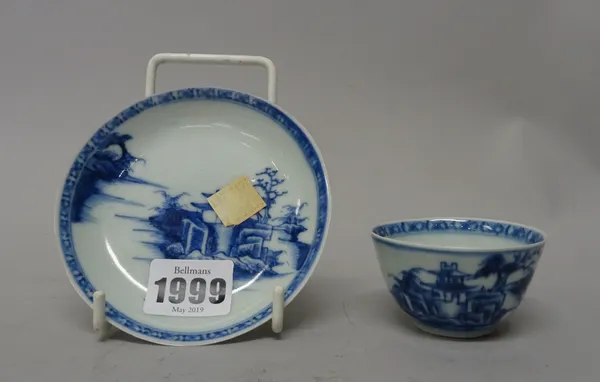 A Chinese blue and white small teabowl and saucer from the Nanking cargo, Qianlong, painted with the `Pagoda Riverscape' pattern, Christie's paper lab