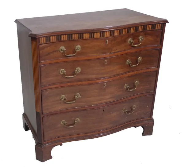 A George III inlaid mahogany serpentine chest, with four long graduated drawers on bracket feet, 91cm wide x 84cm high x 49cm deep. Provenance; proper