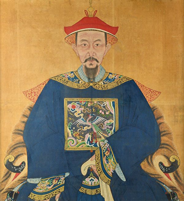 Chinese school, 19th century, an ancestor painting on silk, depicting a seated man in red hat and blue robe bearing a civil rank badge, 98cm. by 91cm.