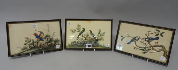 Three Chinese paintings on rice paper, 19th century, each painted with a pair of birds on rocks or in branches, 15cm. by 24.5cm., framed and glazed, (