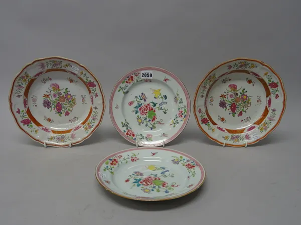 A pair of Chinese famille-rose plates, Qianlong, each painted with flowers inside a pink diaper border, 22cm. diameter; also a pair of famille-rose ex