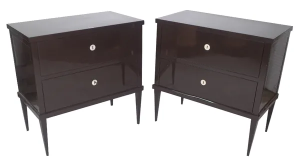 A pair of 20th century brown lacquer two drawer chests on tapering supports, 82cm wide x 46cm deep x 83cm high. (2)  Provenance; property from the lat