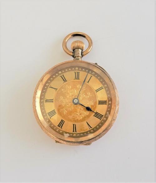 A lady's gold cased, keyless wind, openfaced fob watch, with a gilt cylinder movement, base metal inner case, the floral engraved gilt dial with black