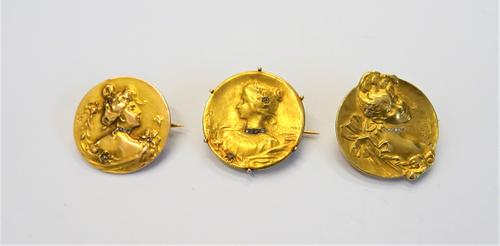 A French gold and diamond set brooch, designed as the Art Nouveau portrait of a lady, detailed below the bust GHERET and to the back 1900 and two furt