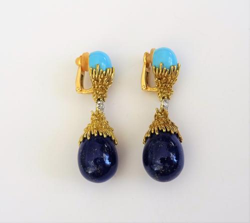 A French pair of gold, diamond set, enamel imitating lapis lazuli and turquoise coloured enamel earclips, each with an egg shaped enamel imitating lap