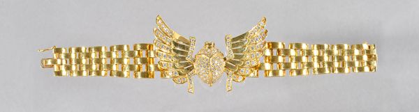 A gold and diamond set bracelet, by Petros & Takis, the front of the bracelet formed as a diamond set winged scarab beetle, mounted with circular cut