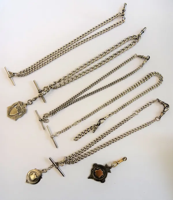 Five silver curb link watch Albert chains, with five silver T bars, swivels and also three fob medallions as fitted, combined weight of silver 190 gms