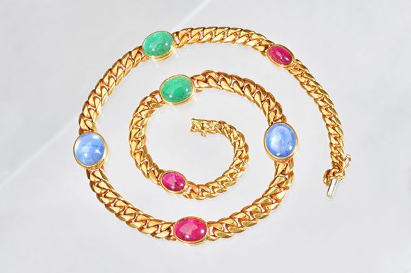 A Bvlgari gold, sapphire, ruby and emerald necklace, in a graduated curved curb link design, mounted with two cabochon sapphires, three cabochon rubie