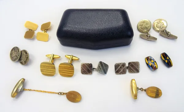 A pair of 9ct gold cut cornered rectangular cufflinks, with engine turned decoration, Birmingham 1938, weight 6.5 gms, with a case, four further pairs