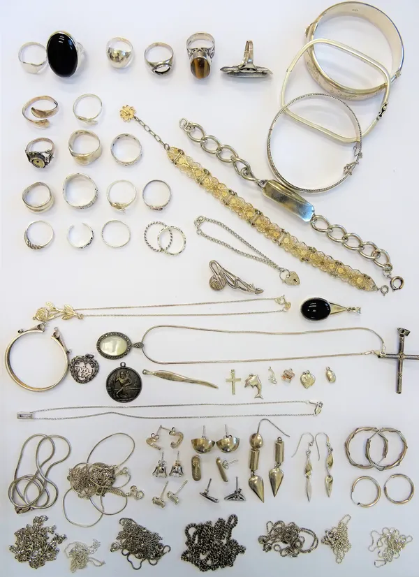 Mostly silver jewellery, comprising; twenty rings, ten pairs of earrings, twelve necklaces and neckchains, three bracelets, three bangles, a brooch, t