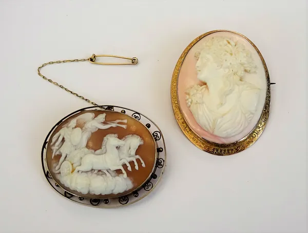 A gold mounted oval shell cameo brooch, carved as a classical chariot scene above clouds, the mount decorated with bead and wirework motifs at interva