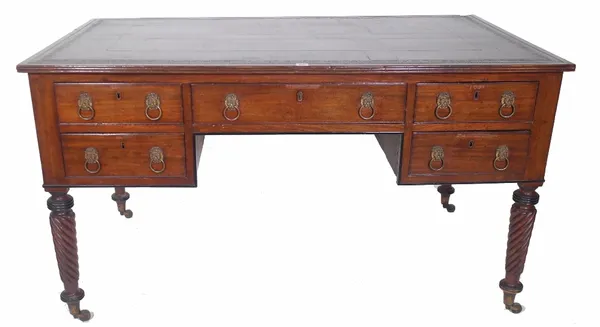 A George III mahogany kneehole desk, with five drawers on spiral twisted tapering suports, 143cm wide x 83cm deep x 80cm high. Provenance; property fr