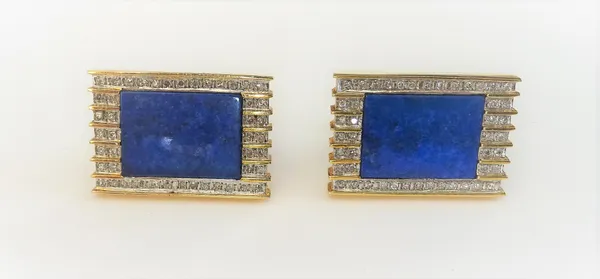 A pair of gold and lapis lazuli rectangular cufflinks, each mounted with a central lapis lazuli rectangular panel, in a surround of circular cut diamo